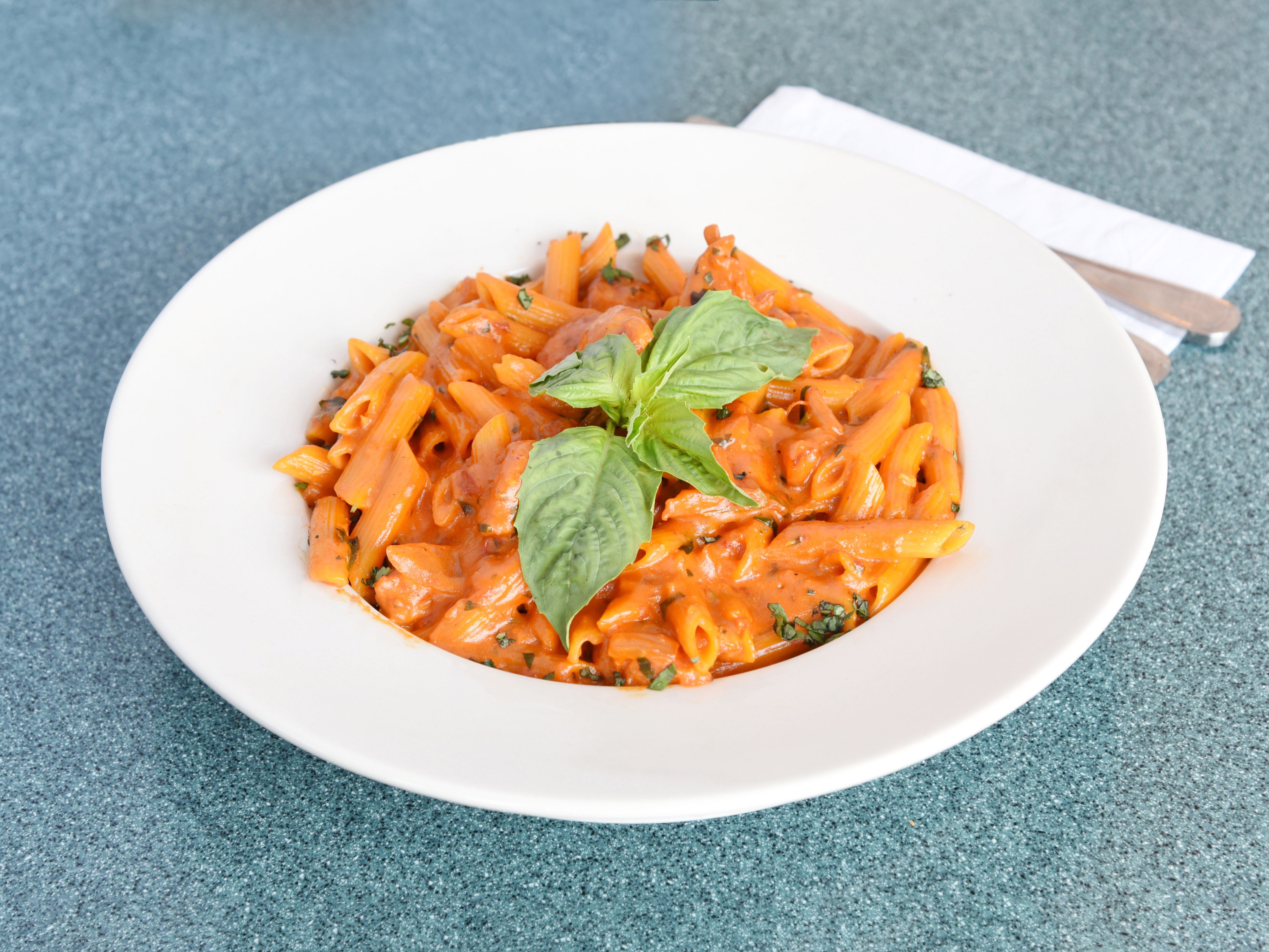 Order Penne with Chicken Alla Vodka food online from Bedford Park Cafe store, Bronx on bringmethat.com