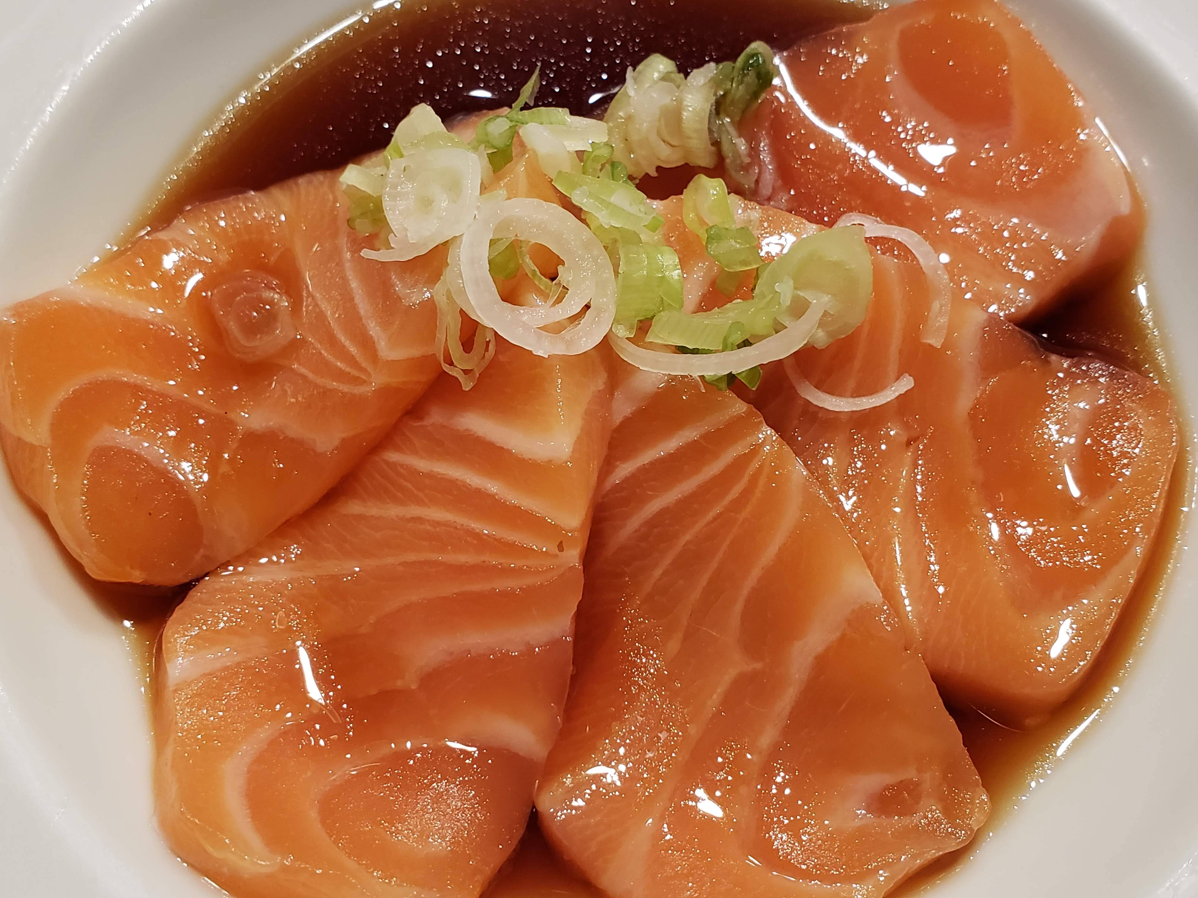 Order Salmon Carpaccio  food online from Nikko Sushi store, Arlington Heights on bringmethat.com