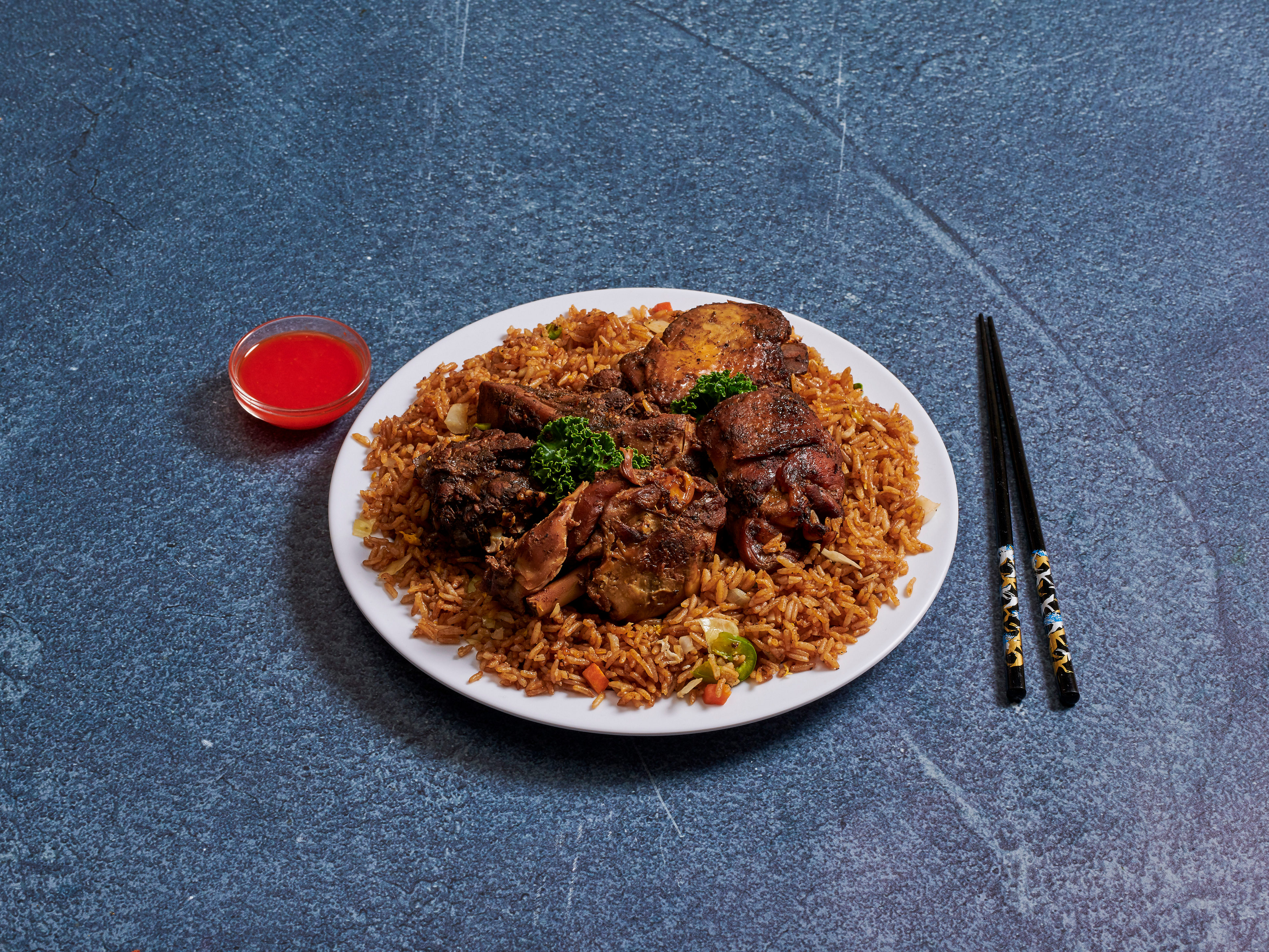 Order Jerk Chicken Fried Rice food online from Hibiscus store, South Richmond Hill on bringmethat.com