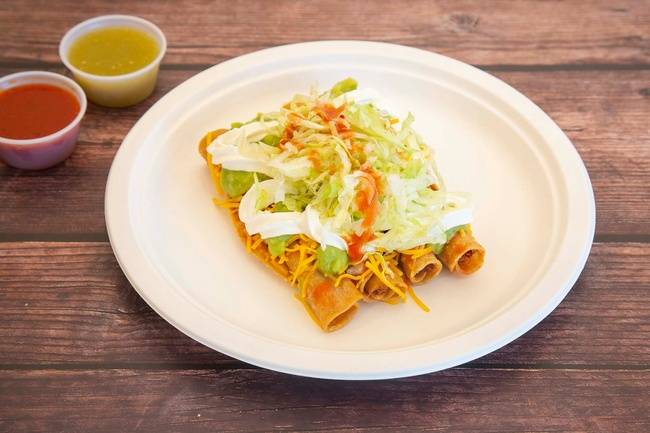 Order 4 Rolled Tacos food online from Sombrero Mexican Food store, San Diego on bringmethat.com