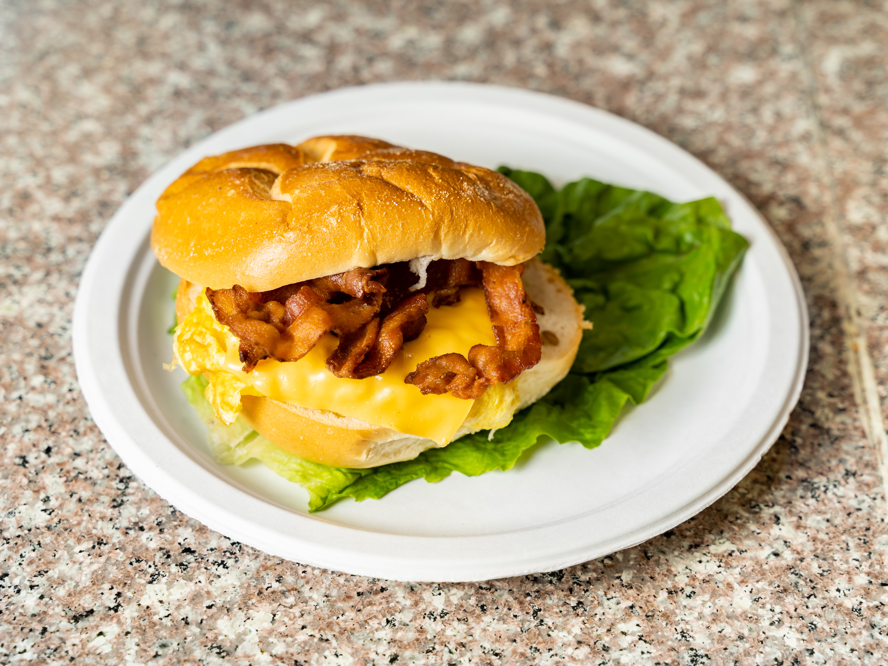 Order 4. Bacon, Eggs and Cheese Sandwich After 11 AM food online from 9th ave gourmet store, New York on bringmethat.com
