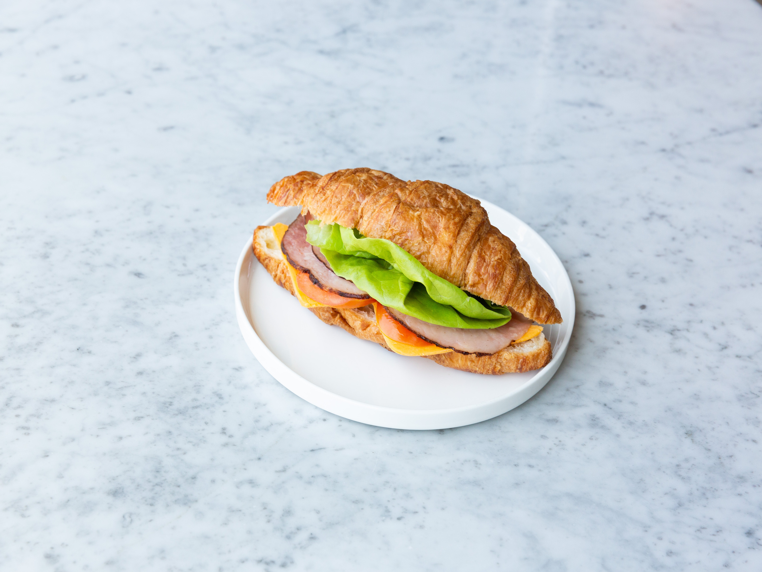 Order Croissant Sandwich food online from In-Sīt Coffee store, Buena Park on bringmethat.com