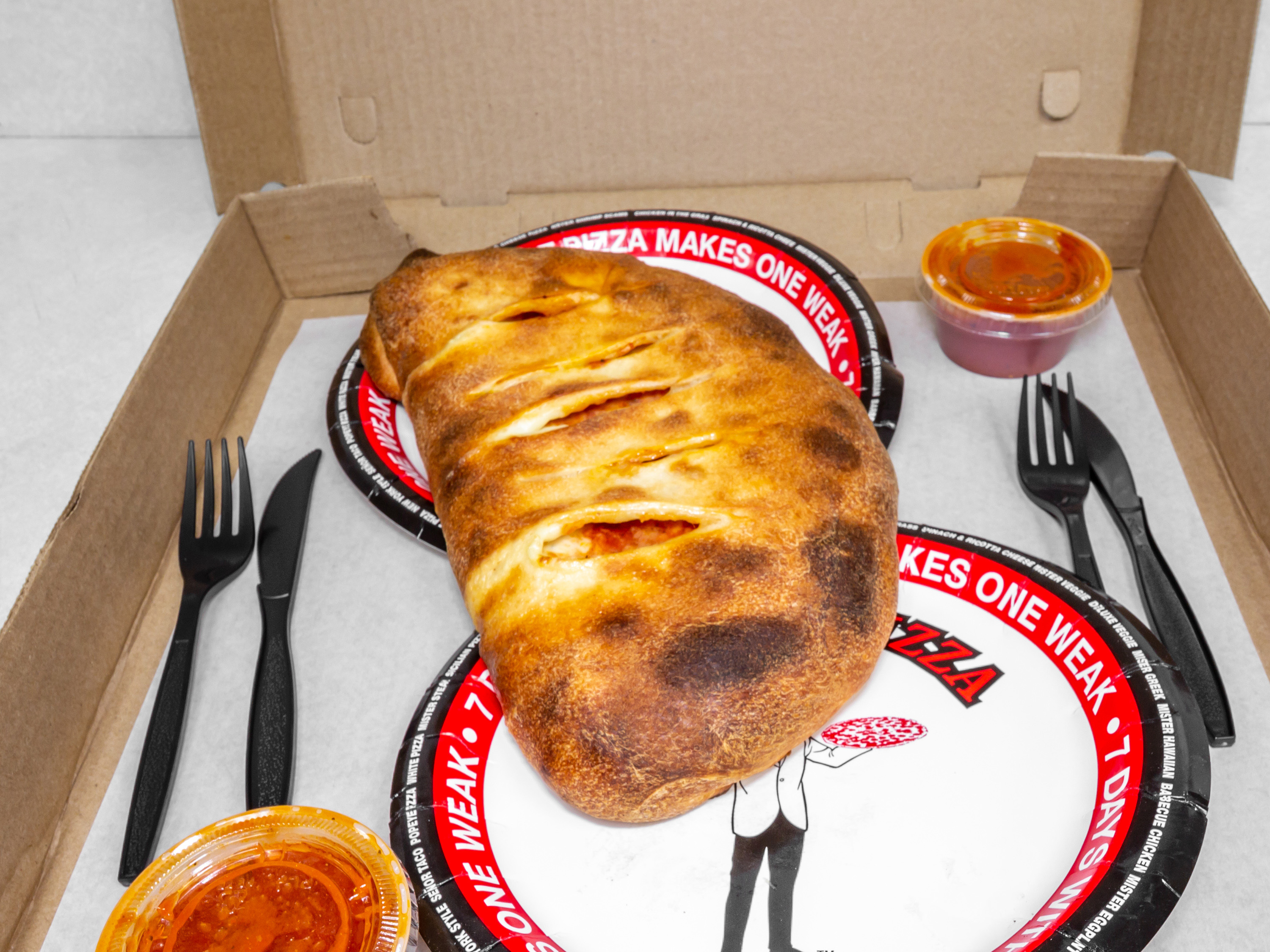 Order Calzone food online from Mister Pizza store, Buffalo on bringmethat.com