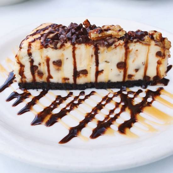 Order Turtle Cheesecake food online from Blue Moon Pizza store, Sandy Springs on bringmethat.com