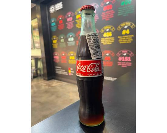Order Mexican Coke (Bottled) food online from Cook's Tortas store, Monterey Park on bringmethat.com
