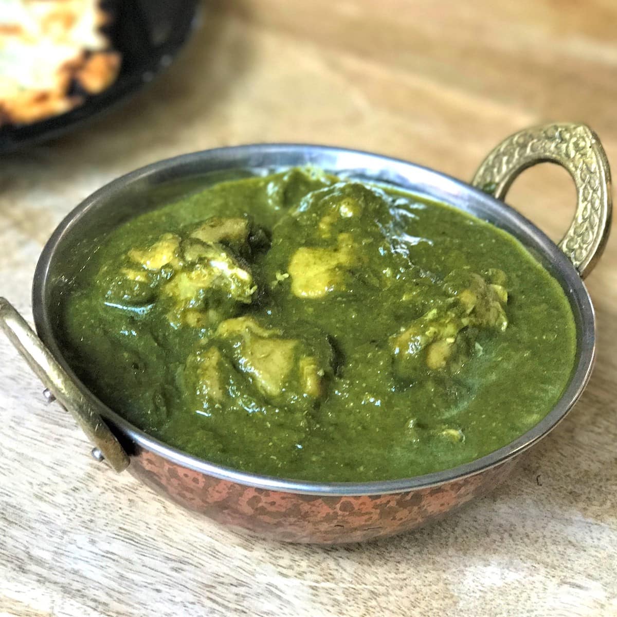 Order Chicken Saag food online from Mango Indian Cuisine store, Bellmore on bringmethat.com