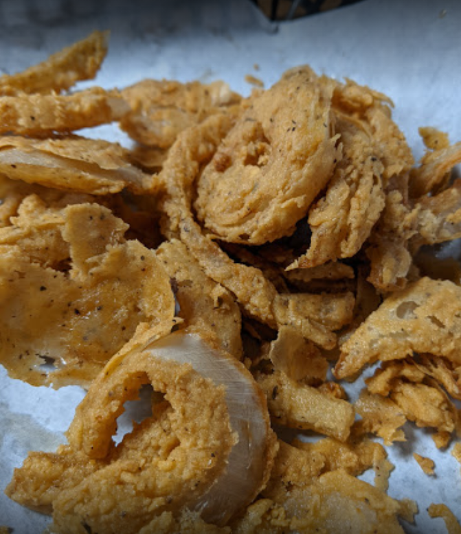 Order Hand Battered Onion Rings-Molehill food online from Packsaddle BBQ store, San Angelo on bringmethat.com