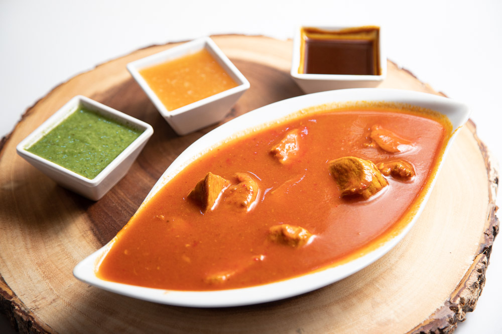 Order 8 CHICKEN CURRY food online from Flavor of India store, Santa Barbara on bringmethat.com