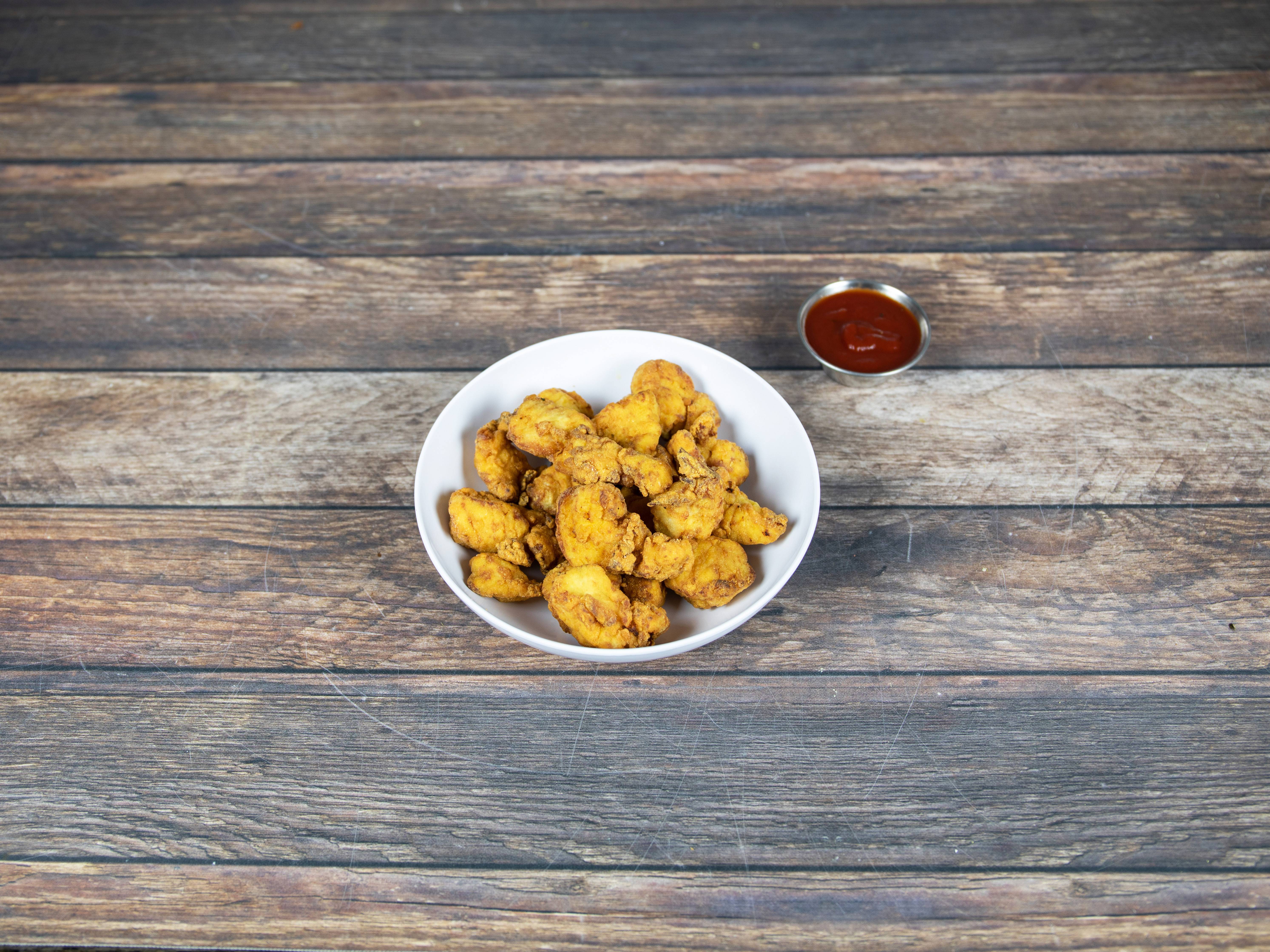 Order Popcorn Chicken food online from Tommy Doyle's store, Newton on bringmethat.com