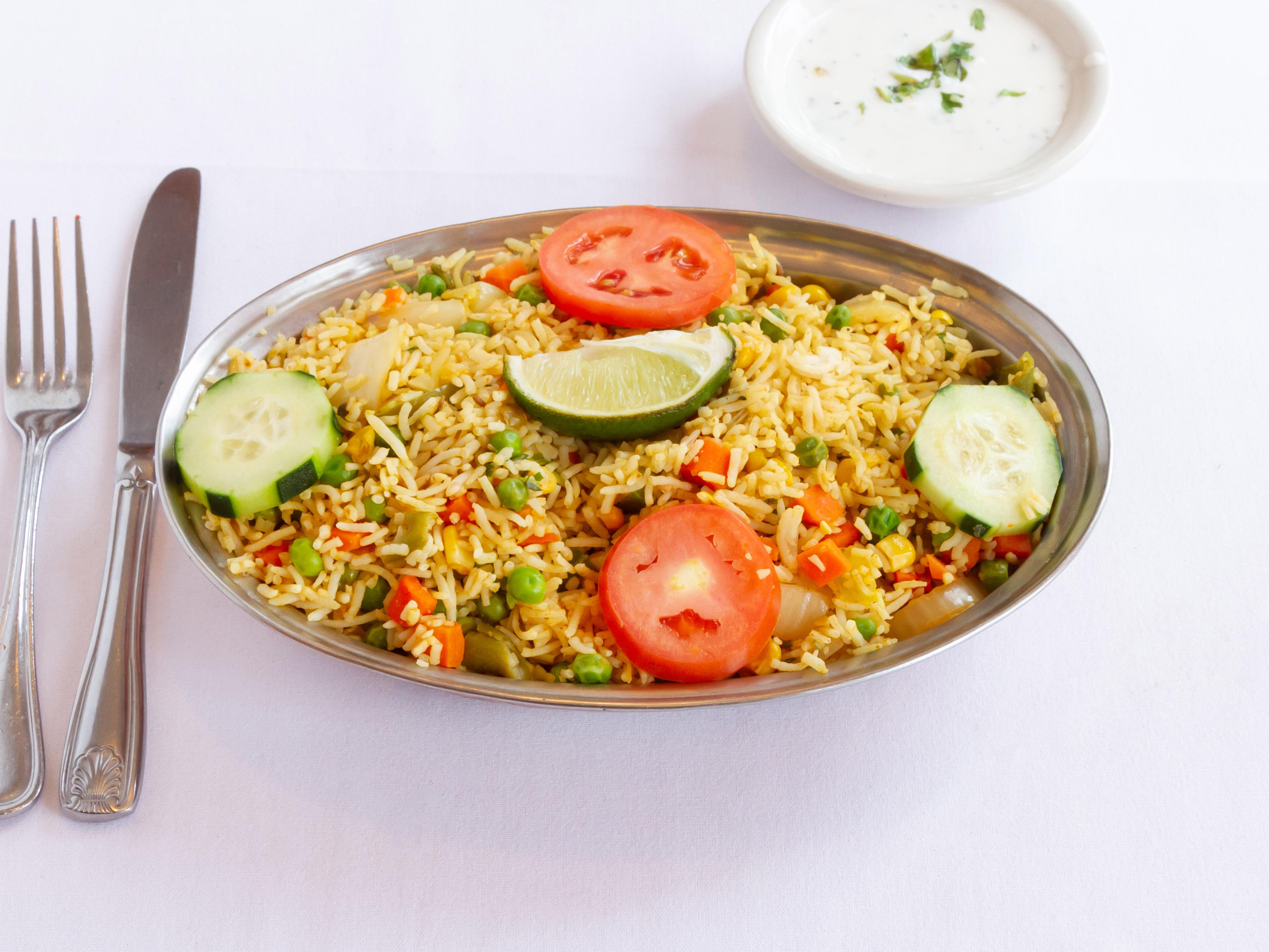 Order Vegetable Biryani food online from Desi Dhaba store, Cambridge on bringmethat.com