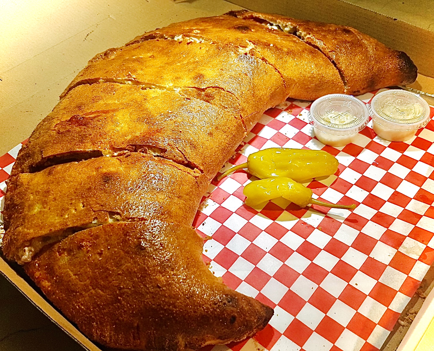 Order Medium Cheese Calzone food online from Paris Pizza & Grill store, San Francisco on bringmethat.com