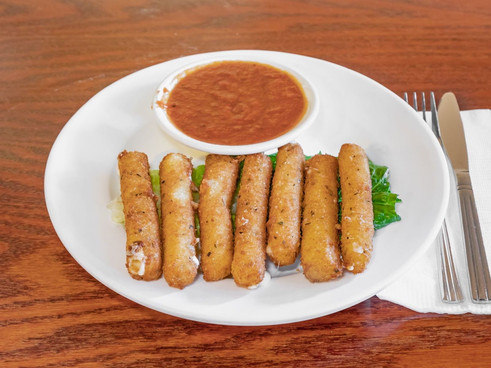 Order Mozzarella Sticks food online from Bus stop cafe store, New York on bringmethat.com