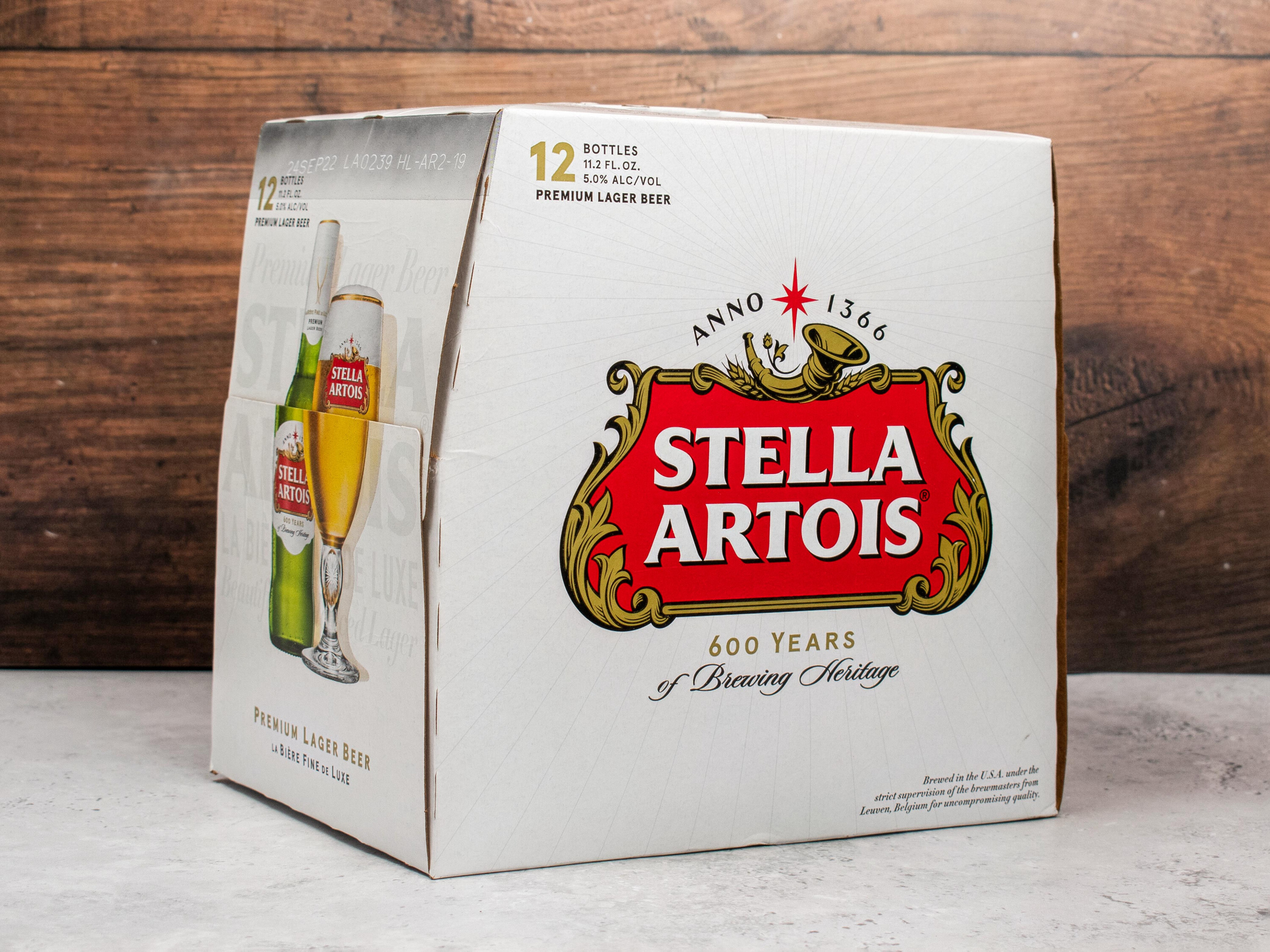 Order Stella Artois, 12 Pack, 12 oz. Bottle Beer food online from Vic Liquors store, El Monte on bringmethat.com