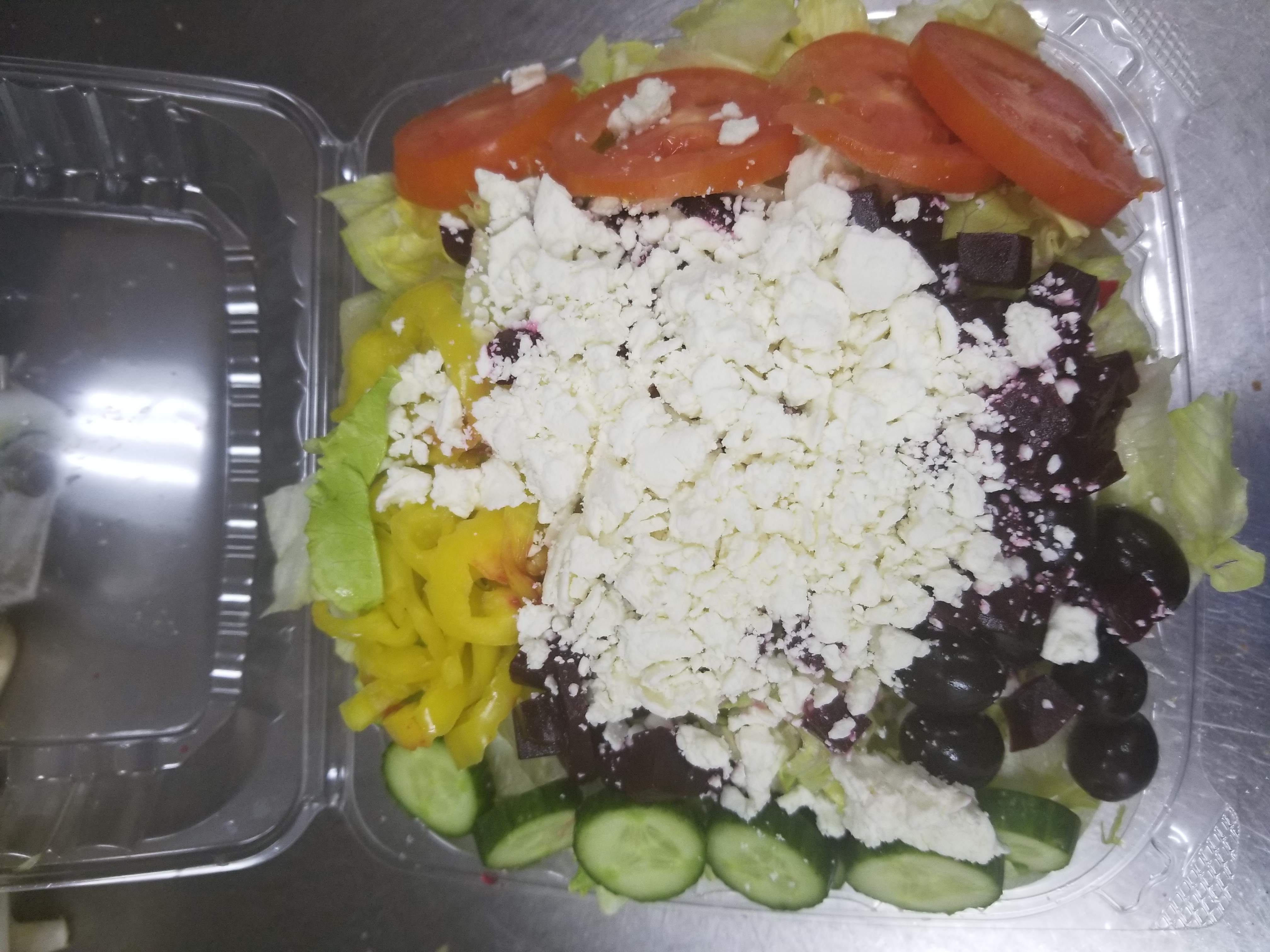 Order Greek Salad food online from Golden Halal Pizza store, Dearborn Heights on bringmethat.com