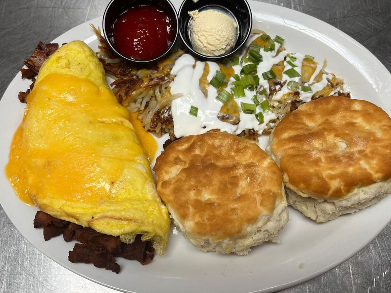 Order Bacon Omelet - OO food online from Biscuits Cafe store, Chandler on bringmethat.com