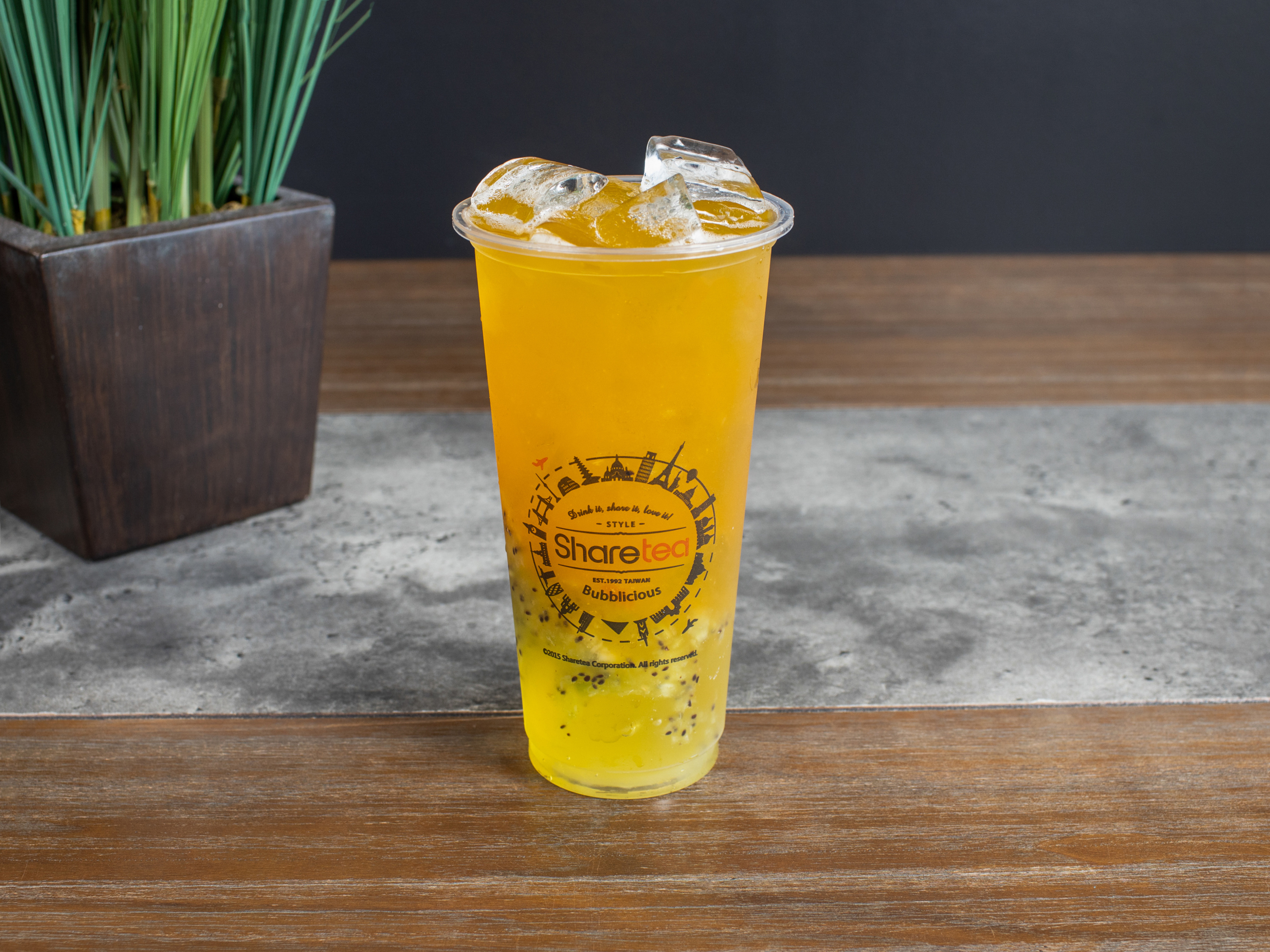 Order Peach Kiwi Tea with Aiyu Jelly food online from Sharetea store, Pearland on bringmethat.com