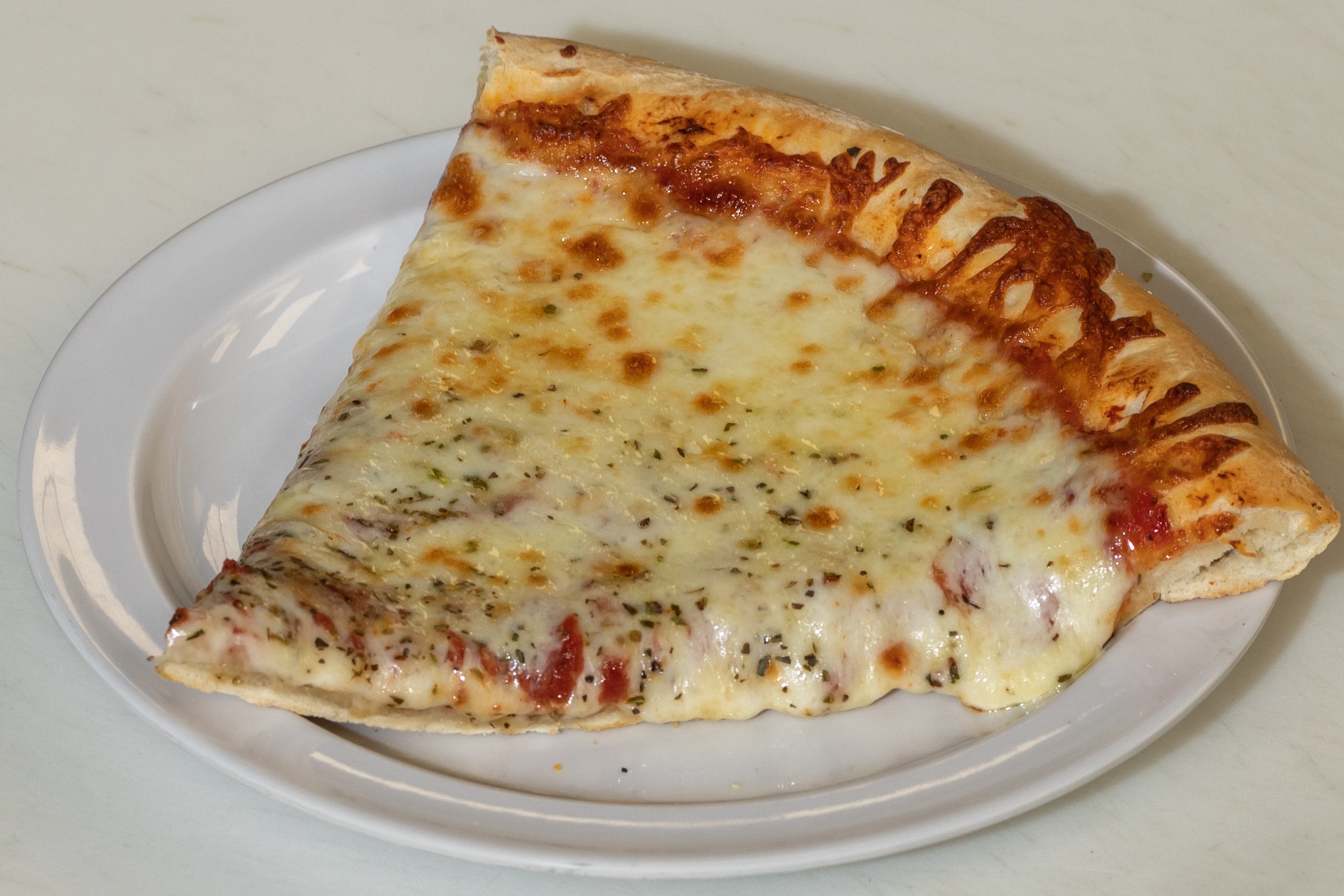 Order Cheese Pizza Slice food online from Tortorice's Pizza & Catering store, Chicago on bringmethat.com