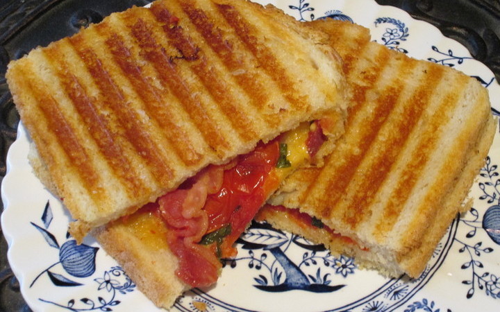 Order Grilled Cheese, Tomato and Bacon Panini food online from Shaw Patio Bar & Grill store, Fort Worth on bringmethat.com
