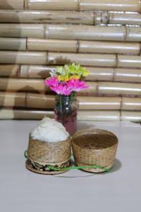 Order 42. Sticky Rice food online from Thai Wok-In & Go store, Dallas on bringmethat.com