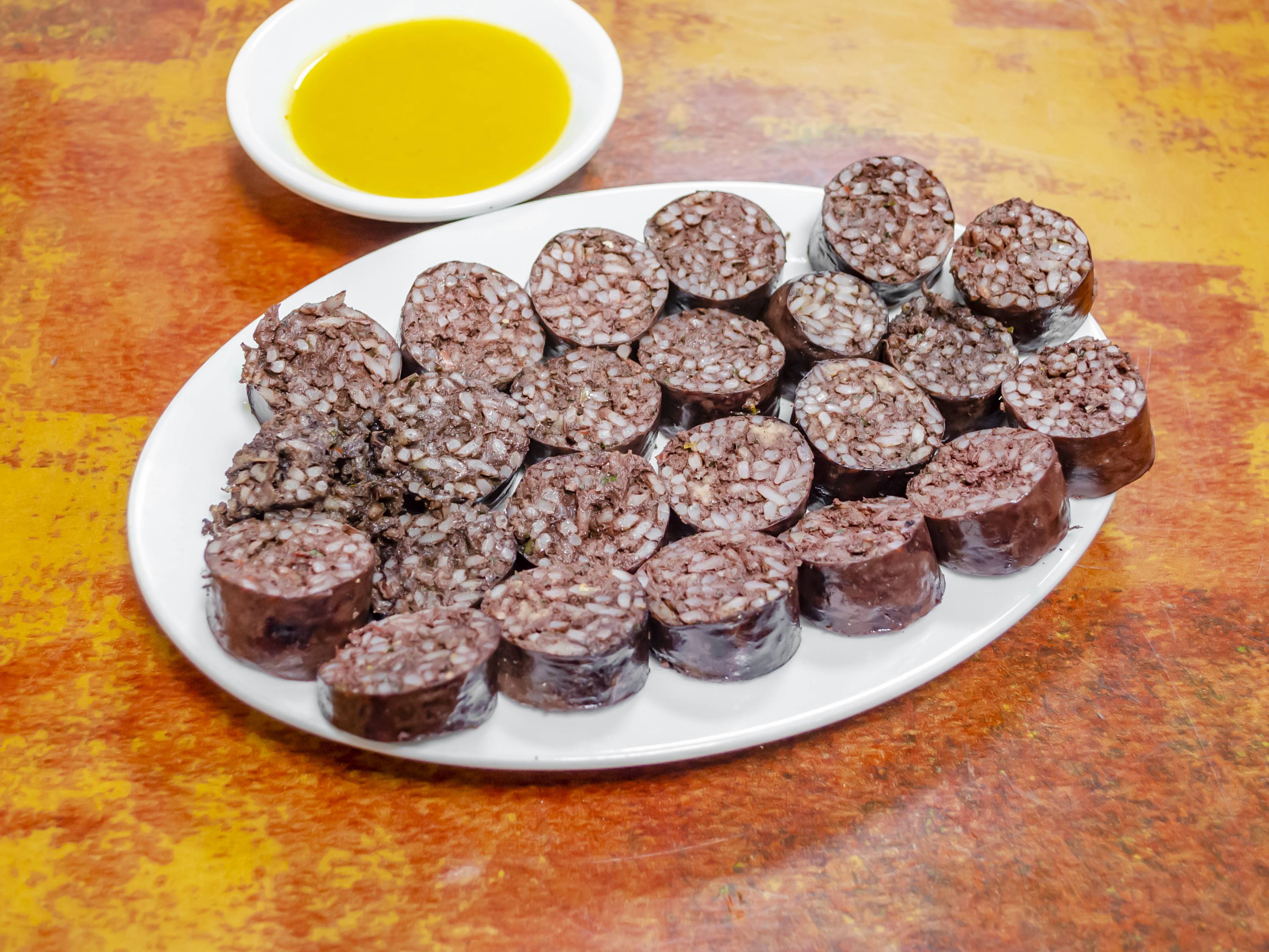 Order Black Pudding food online from Coconut Palm Bar & Grill store, Bronx on bringmethat.com
