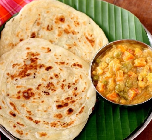 Order Parotta Kurma (2 Pcs) food online from Malgudi Veg store, Ashburn on bringmethat.com