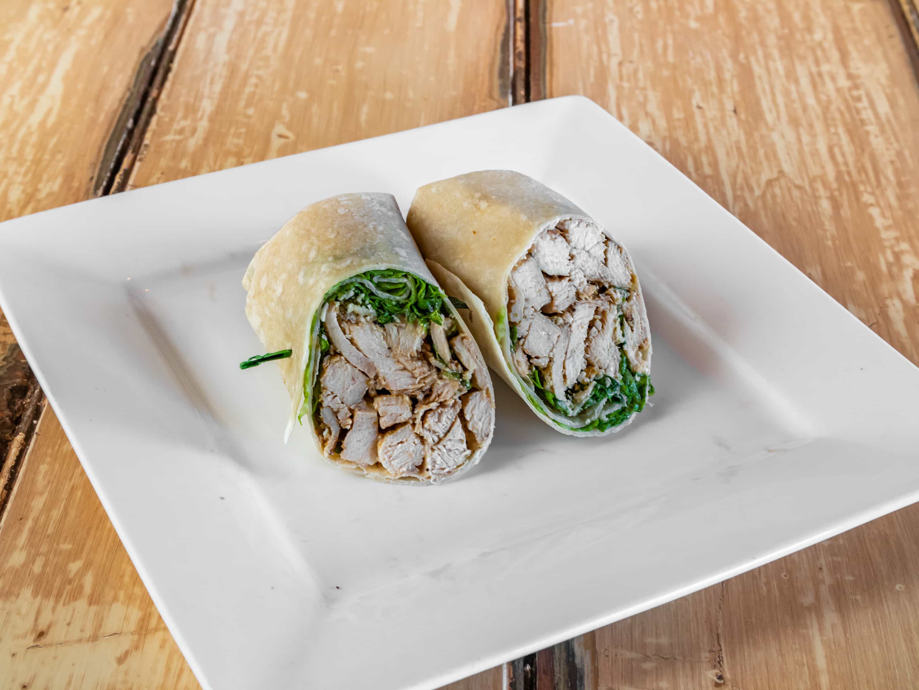 Order Grilled Chicken Caesar Wrap food online from David Alan's Marketplace And Caterers store, East Hanover on bringmethat.com