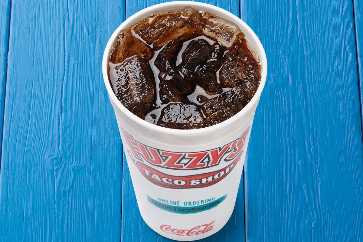 Order 32oz Souvenir Cup w/ Soda food online from Fuzzy's Taco Shop store, Fort Worth on bringmethat.com