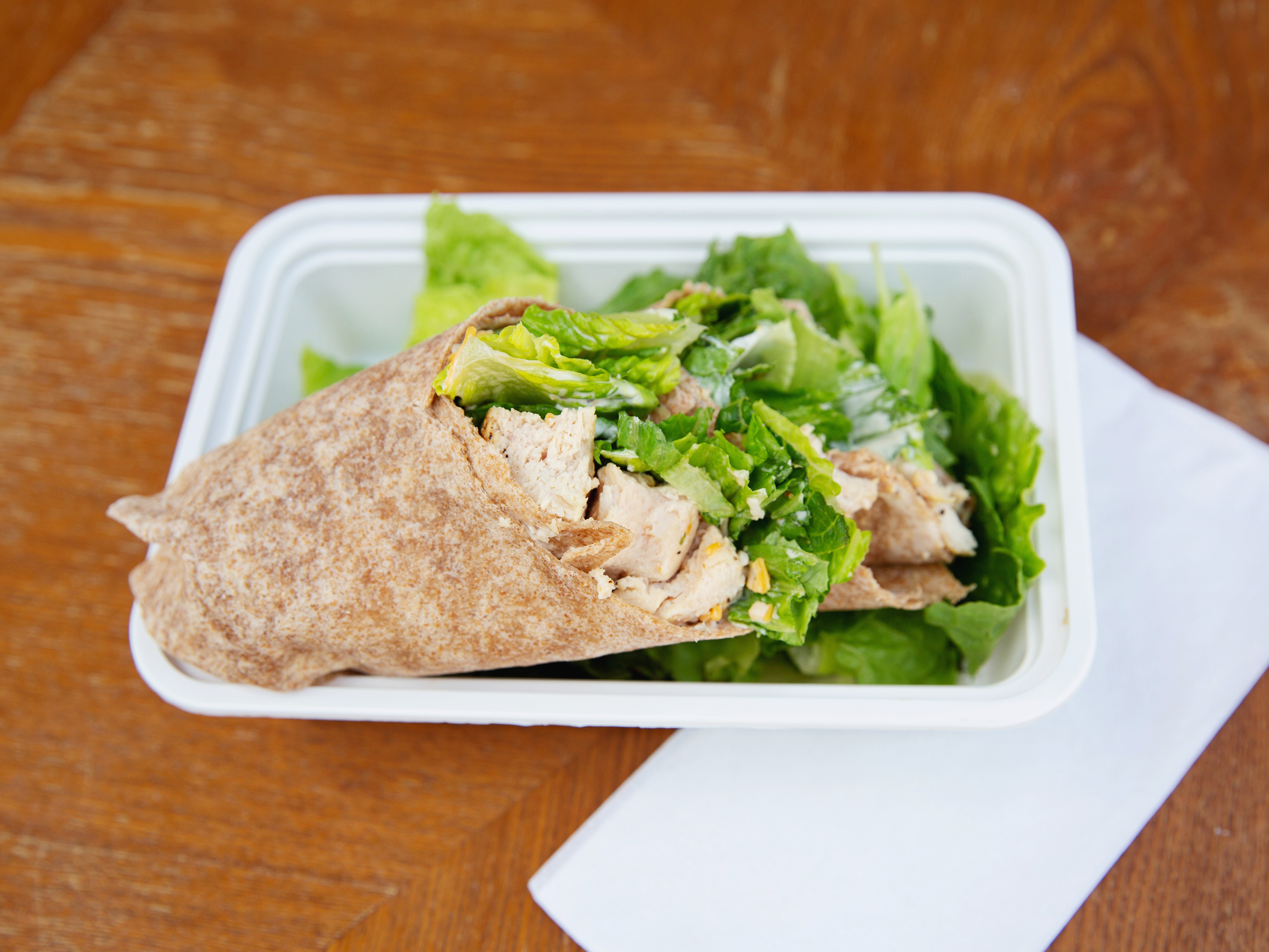 Order Chicken Caesar Wrap food online from 1st Choice Meals store, Metairie on bringmethat.com