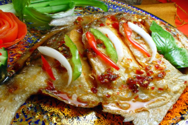 Order 104. Pampano Fish with Garlic Sauce food online from Thai Bamboo store, Northridge on bringmethat.com