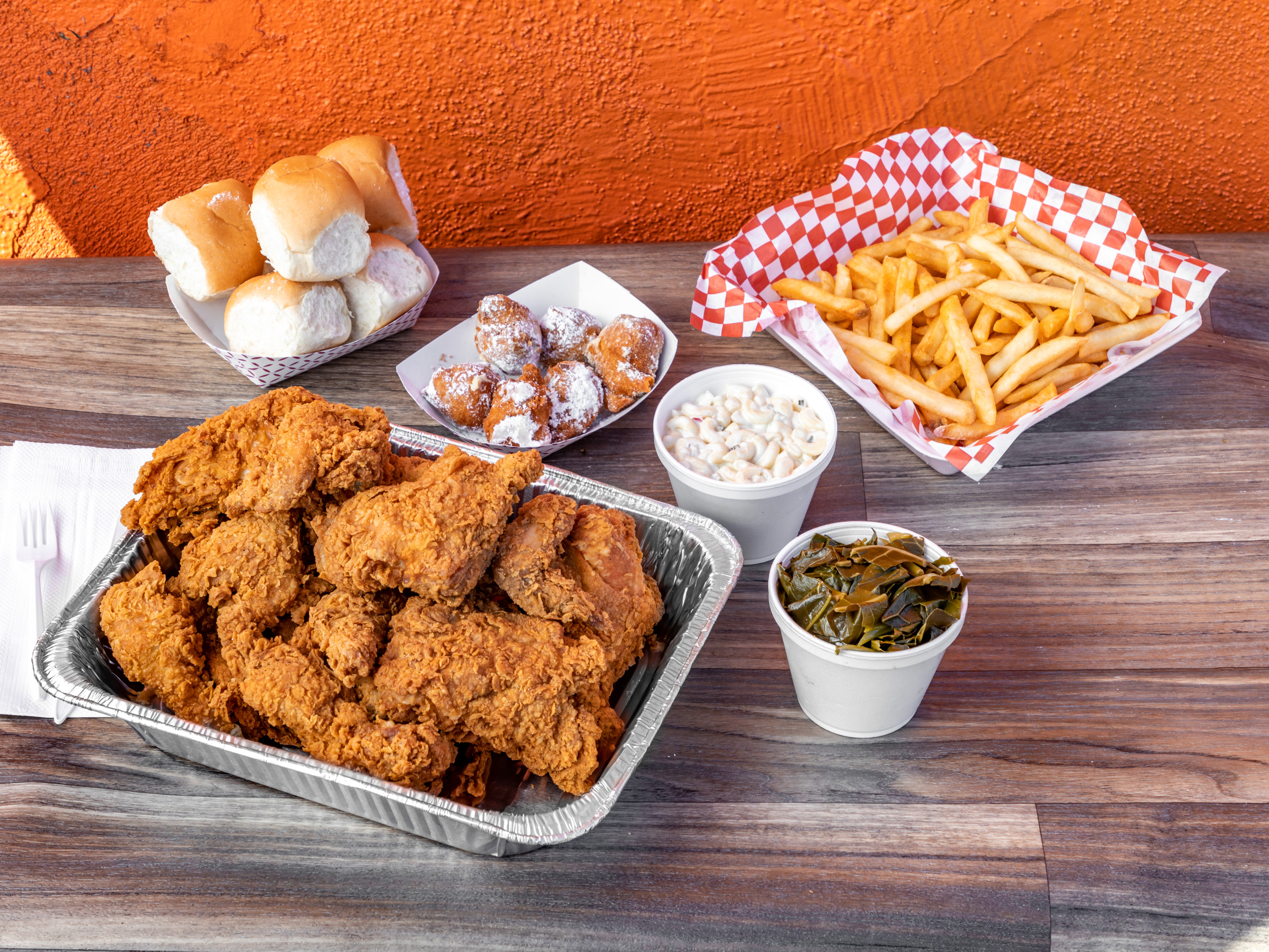 Order 20 Piece Chicken , 3 Large Sides, 6 Roll food online from Charlie Famous Fried Chicken store, Los Angeles on bringmethat.com