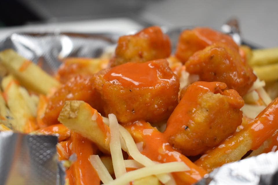 Order Buffalo Chicken Fries food online from Booyah Burgers store, Wyoming on bringmethat.com
