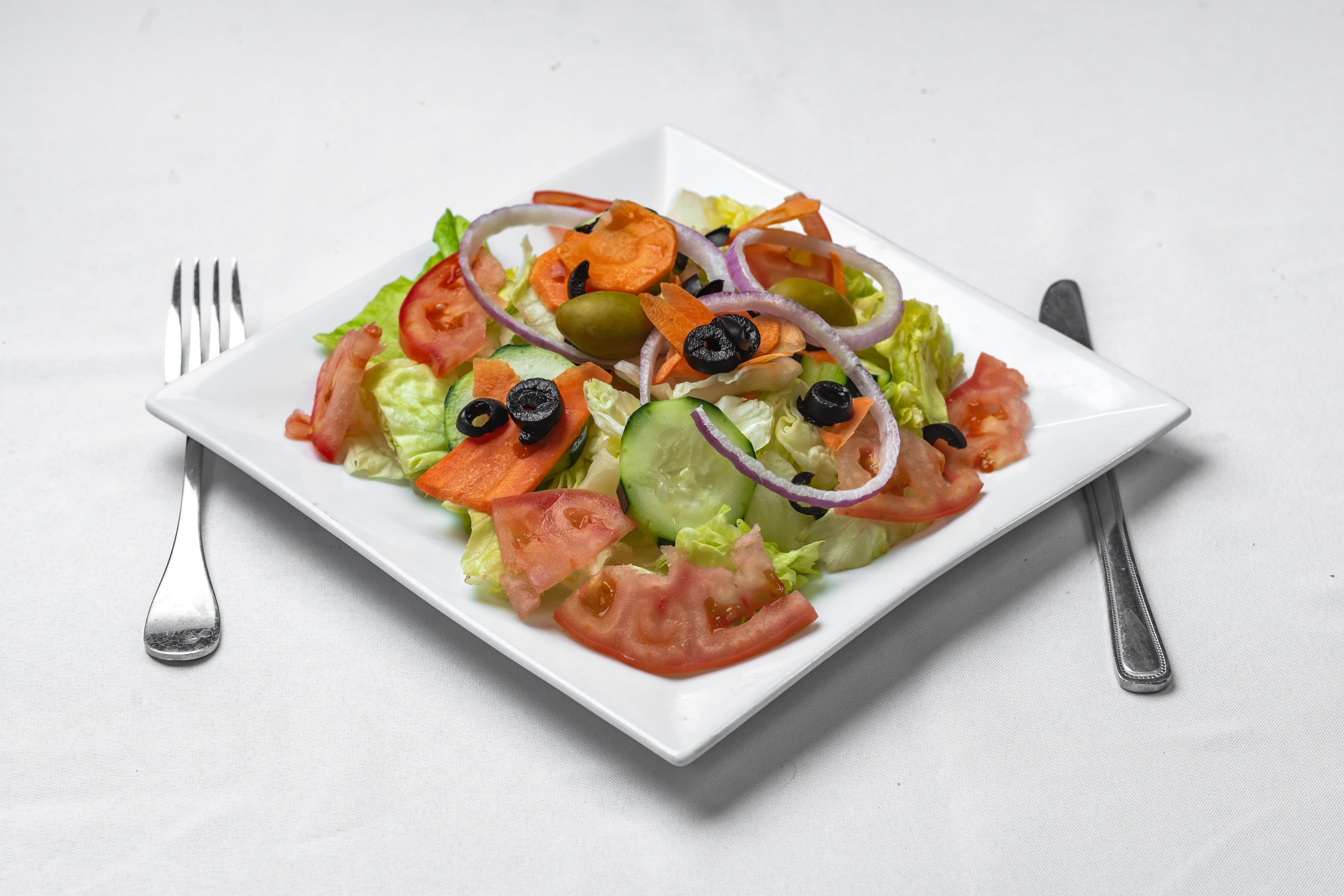 Order Tossed Salad - Small food online from Leo Pizza Italian Restaurant store, Washington on bringmethat.com