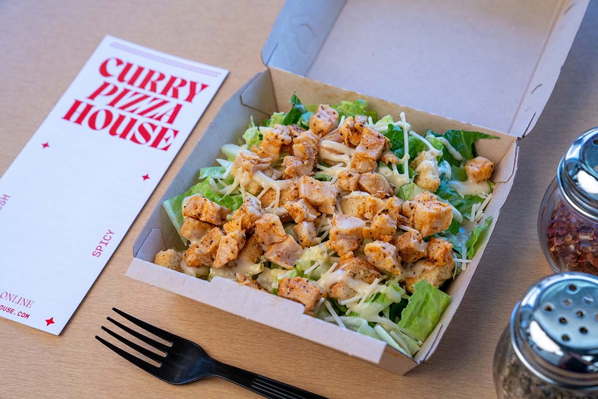 Order Spicy Chicken Caesar Salad food online from Pizza Zombie store, Fremont on bringmethat.com