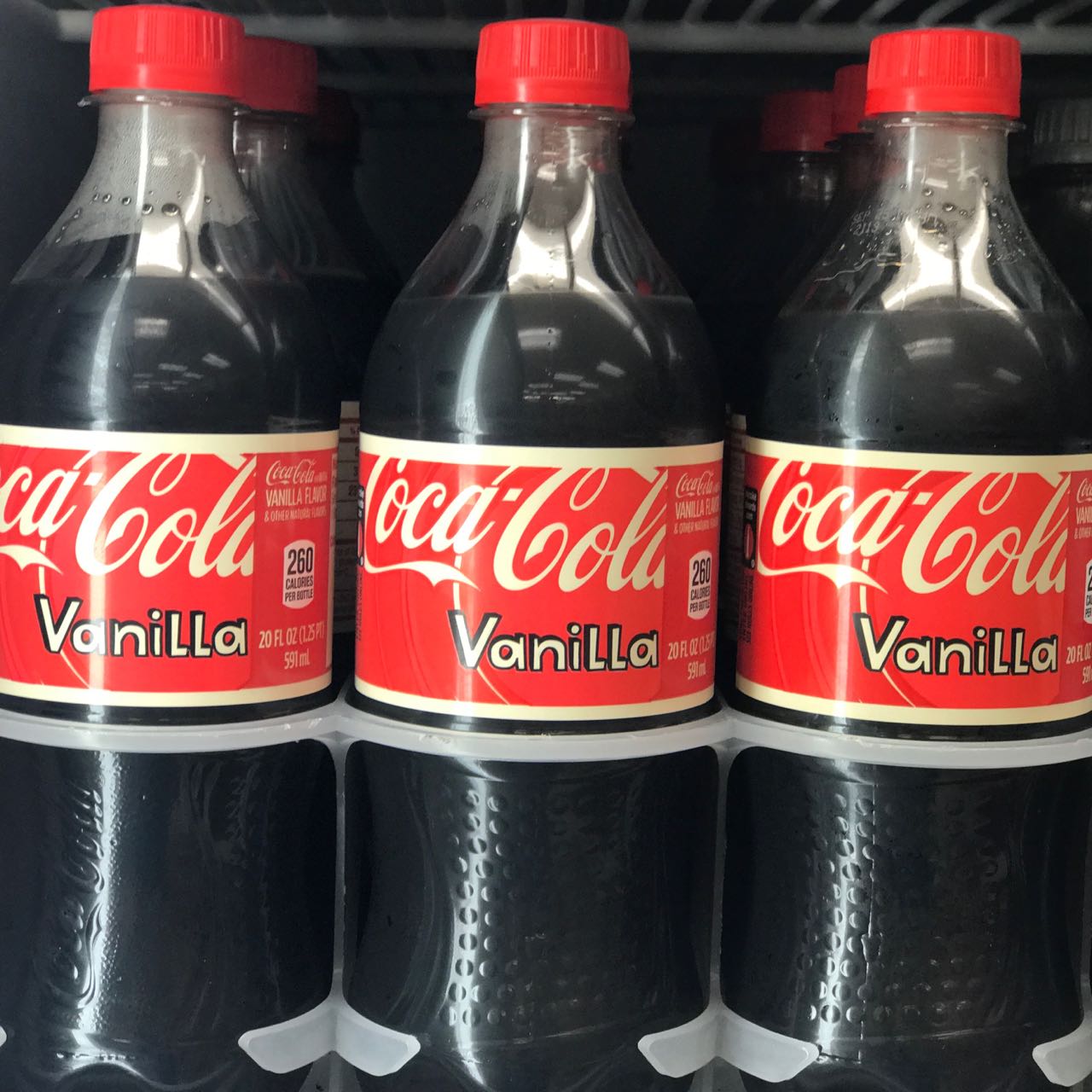 Order 20 oz. Vanilla Coke food online from The Ice Cream Shop store, Providence on bringmethat.com