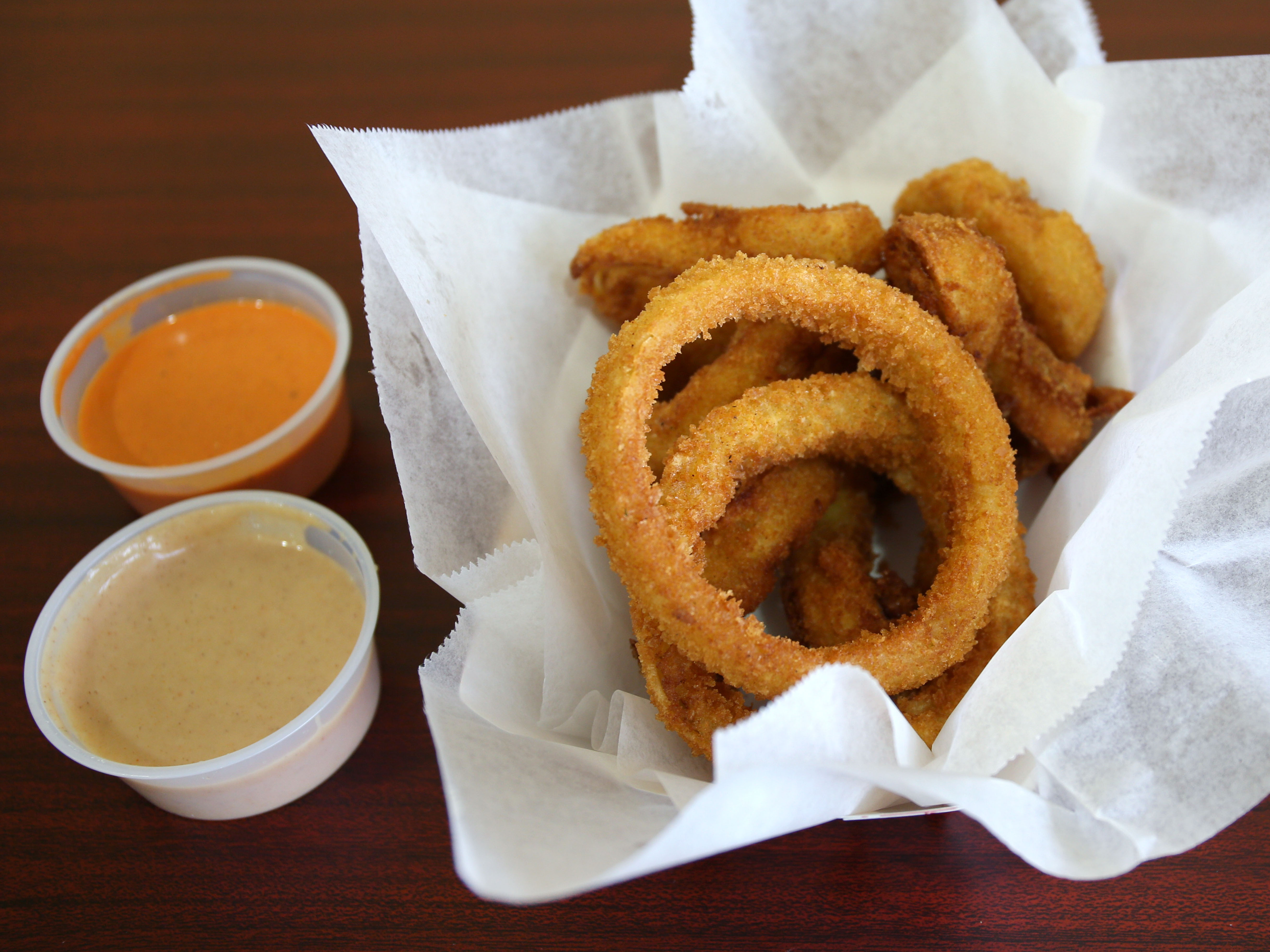 Order Battered Onion Rings food online from Philly Specials store, San Jose on bringmethat.com