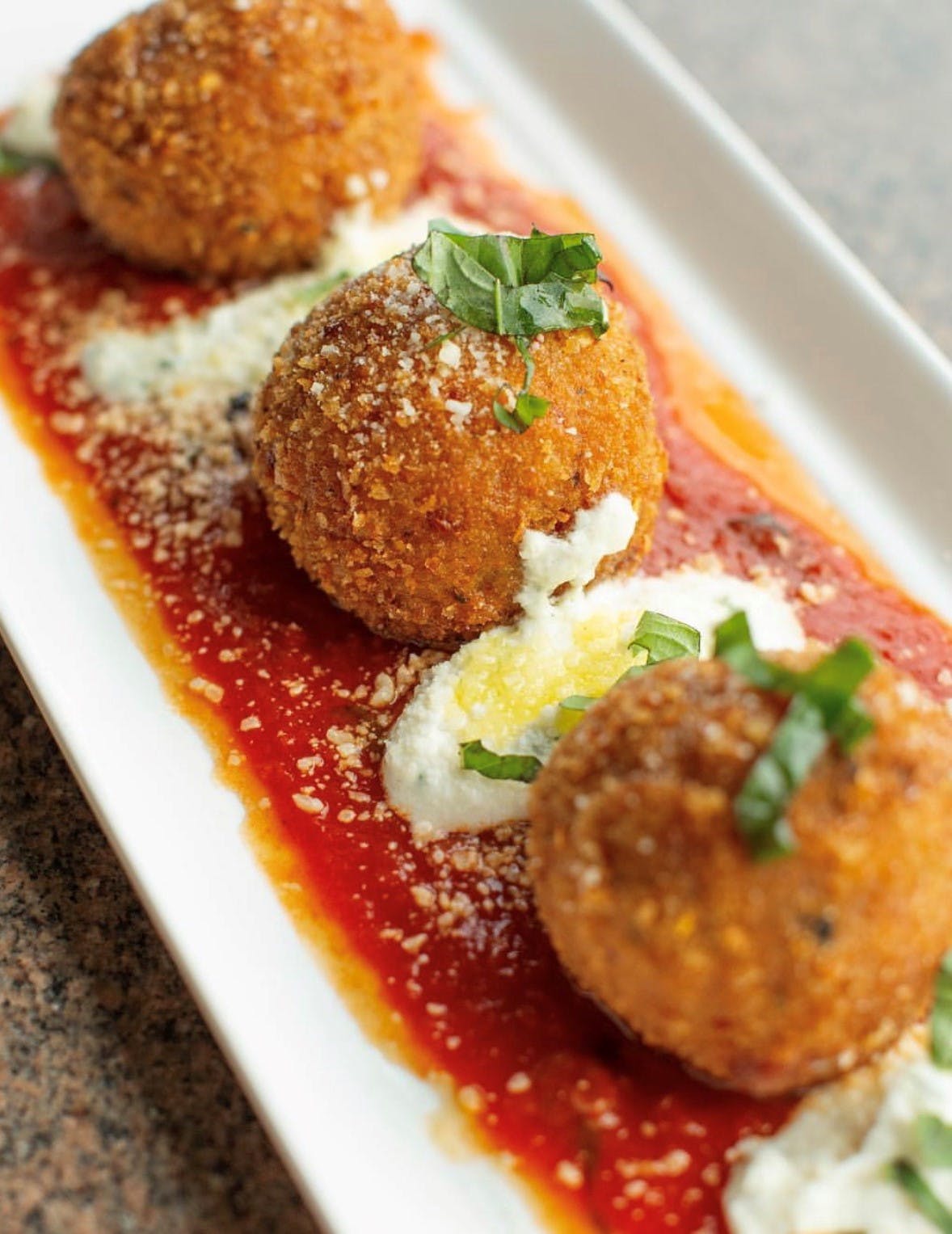 Order Rice Balls - Appetizer food online from Cosimos Pizza Cafe store, Philadelphia on bringmethat.com