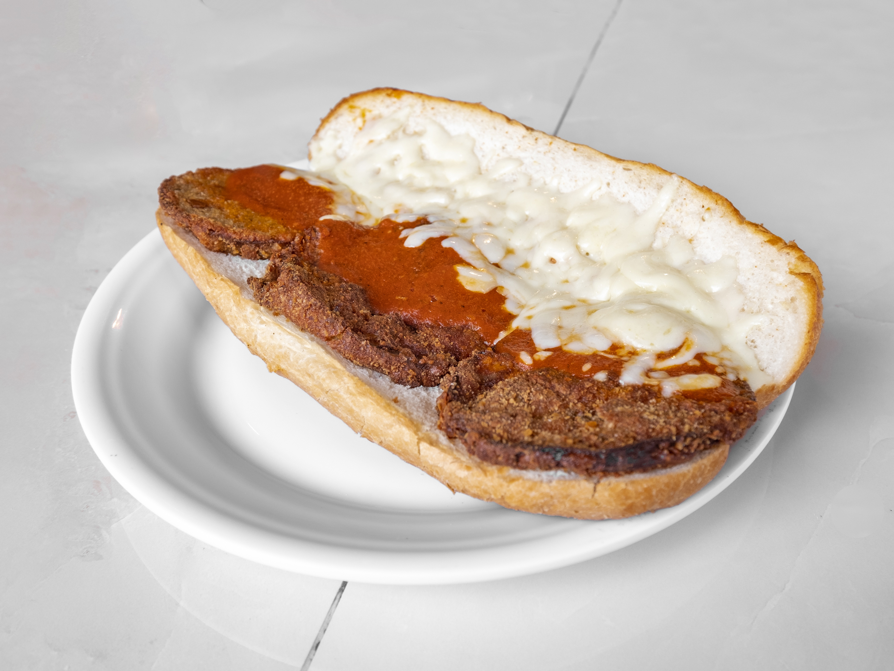 Order Eggplant Parmesan Sub food online from New Yorker Pizza store, Leesburg on bringmethat.com
