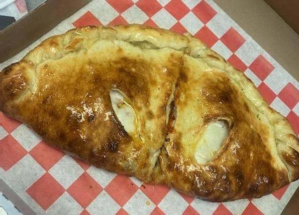 Order Build Your Own Cheese Calzone Small 10" ( Personal) food online from Cataldo Pizzeria store, Bakersfield on bringmethat.com