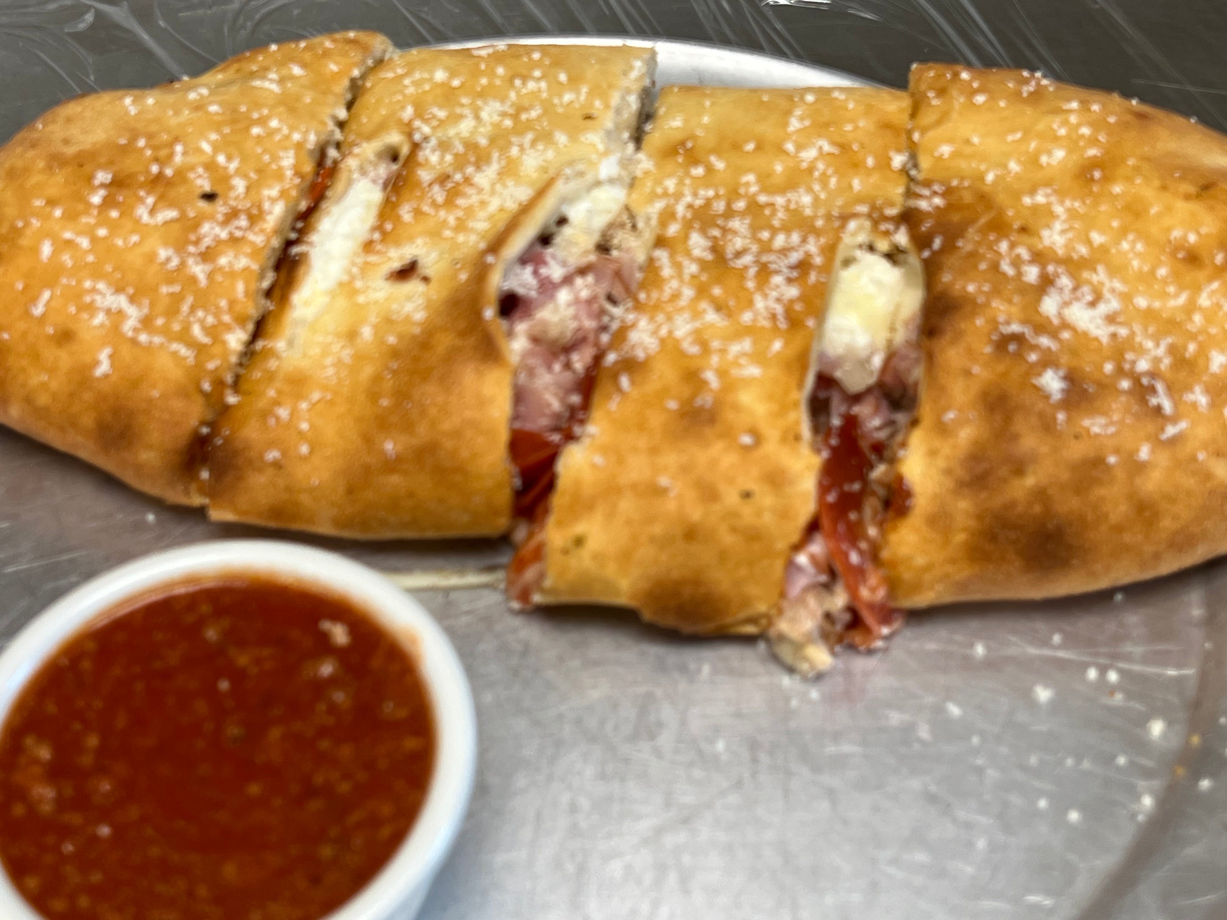 Order Calzone - Calzone food online from Pizza Mia store, Grand Blanc on bringmethat.com