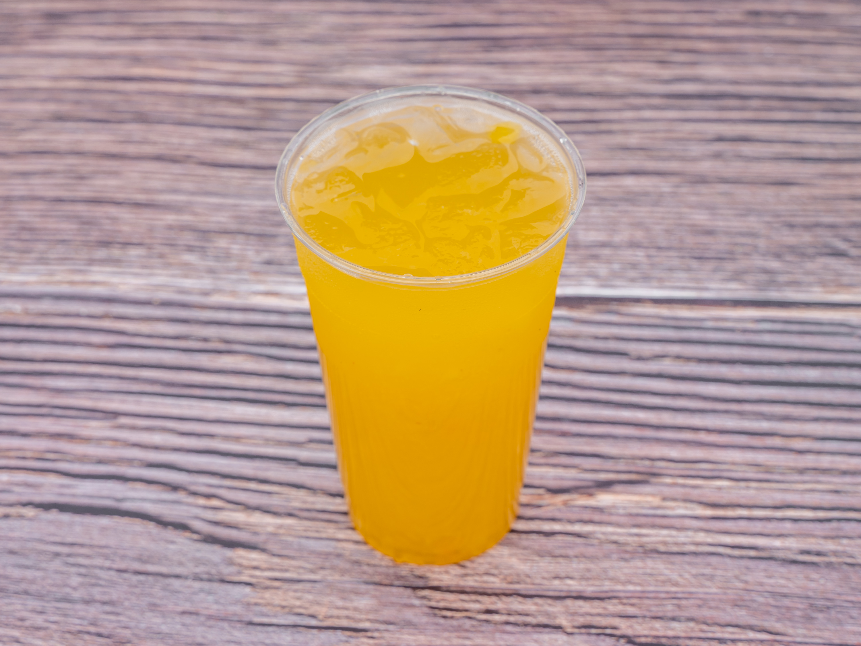 Order Aguas Frescas Mango Pinaple food online from Little Rose Kitchen store, Daly City on bringmethat.com
