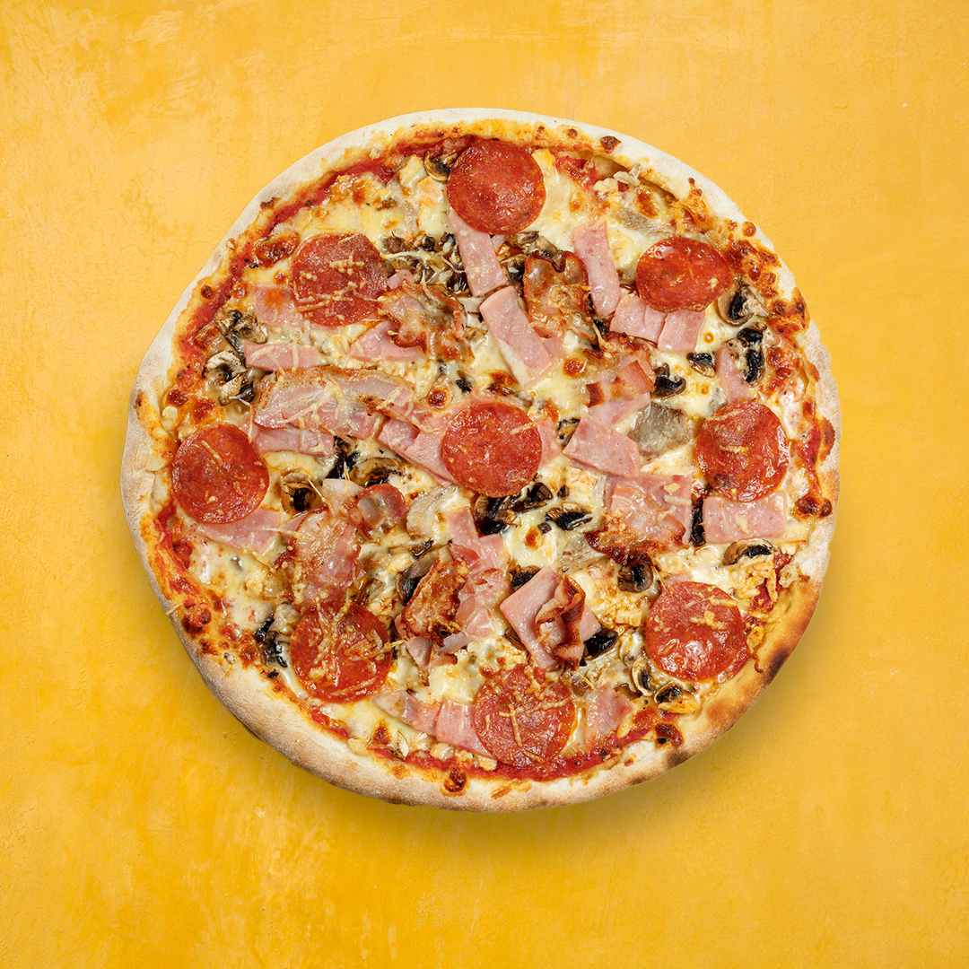 Order 10" Meatlovers Pizza food online from Pizza Zone store, Oklahoma City on bringmethat.com