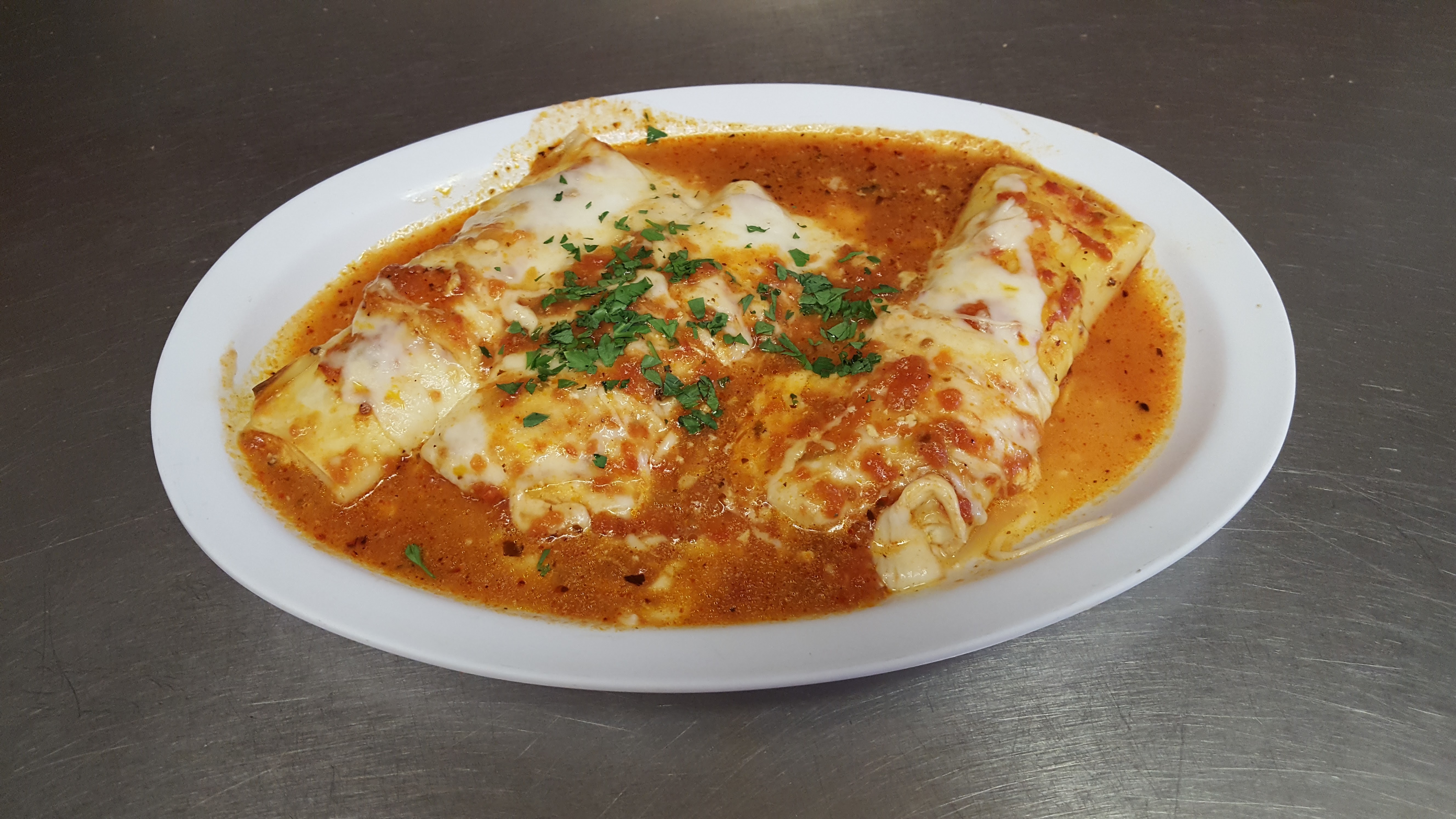 Order Manicotti food online from Pizzarelli's Pizza store, Scarsdale on bringmethat.com