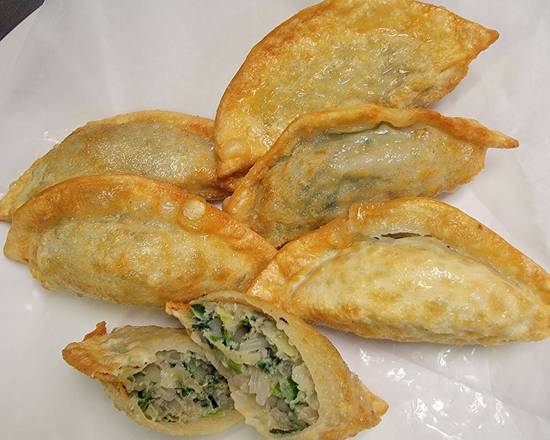 Order Fried Dumplings (6 pc) food online from Amazing Wings store, Stone Mountain on bringmethat.com