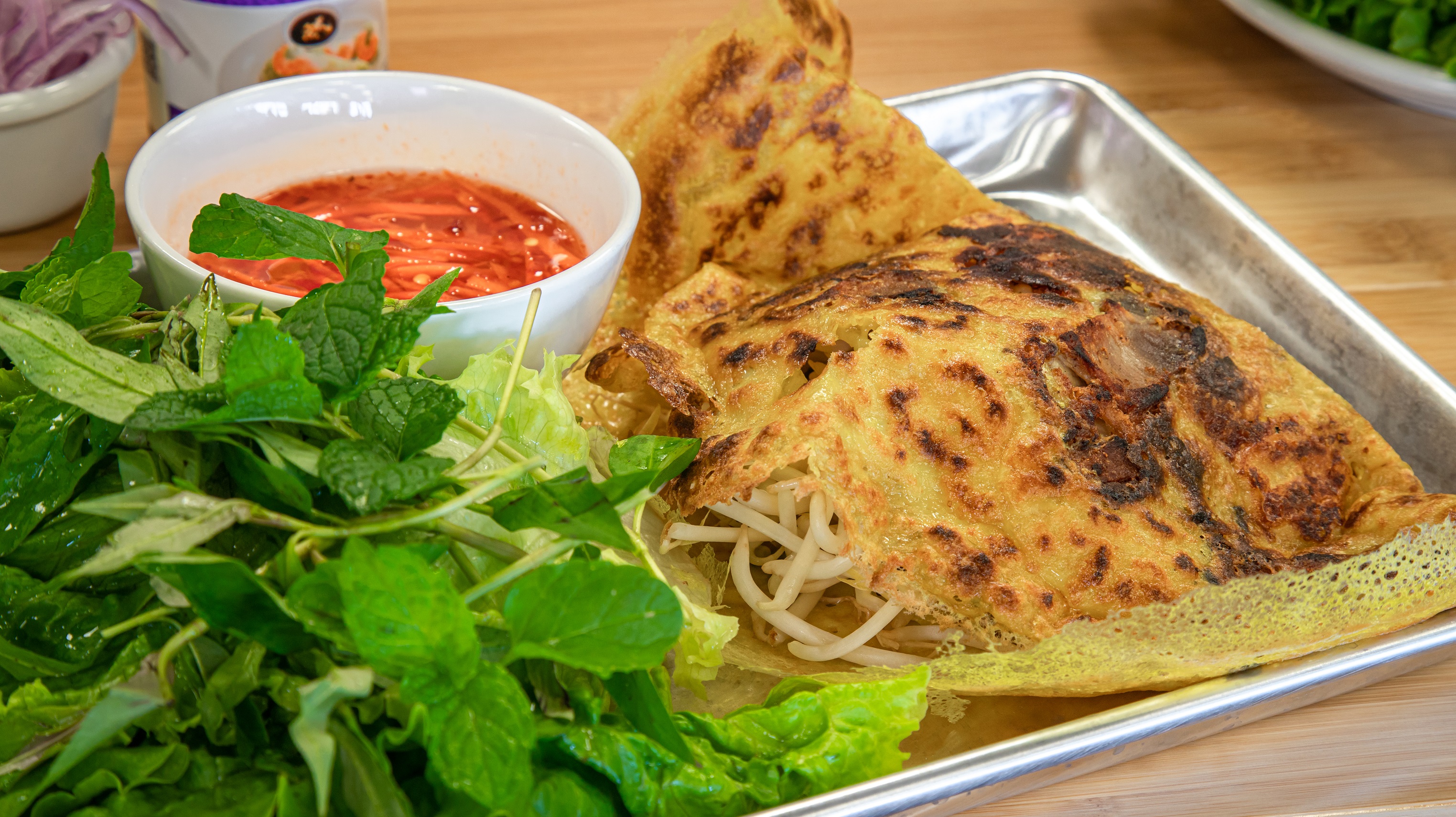 Order 35. Banh Xeo Vietnamese Crepes food online from Pho Cafe Hong Kong Diner store, Reno on bringmethat.com