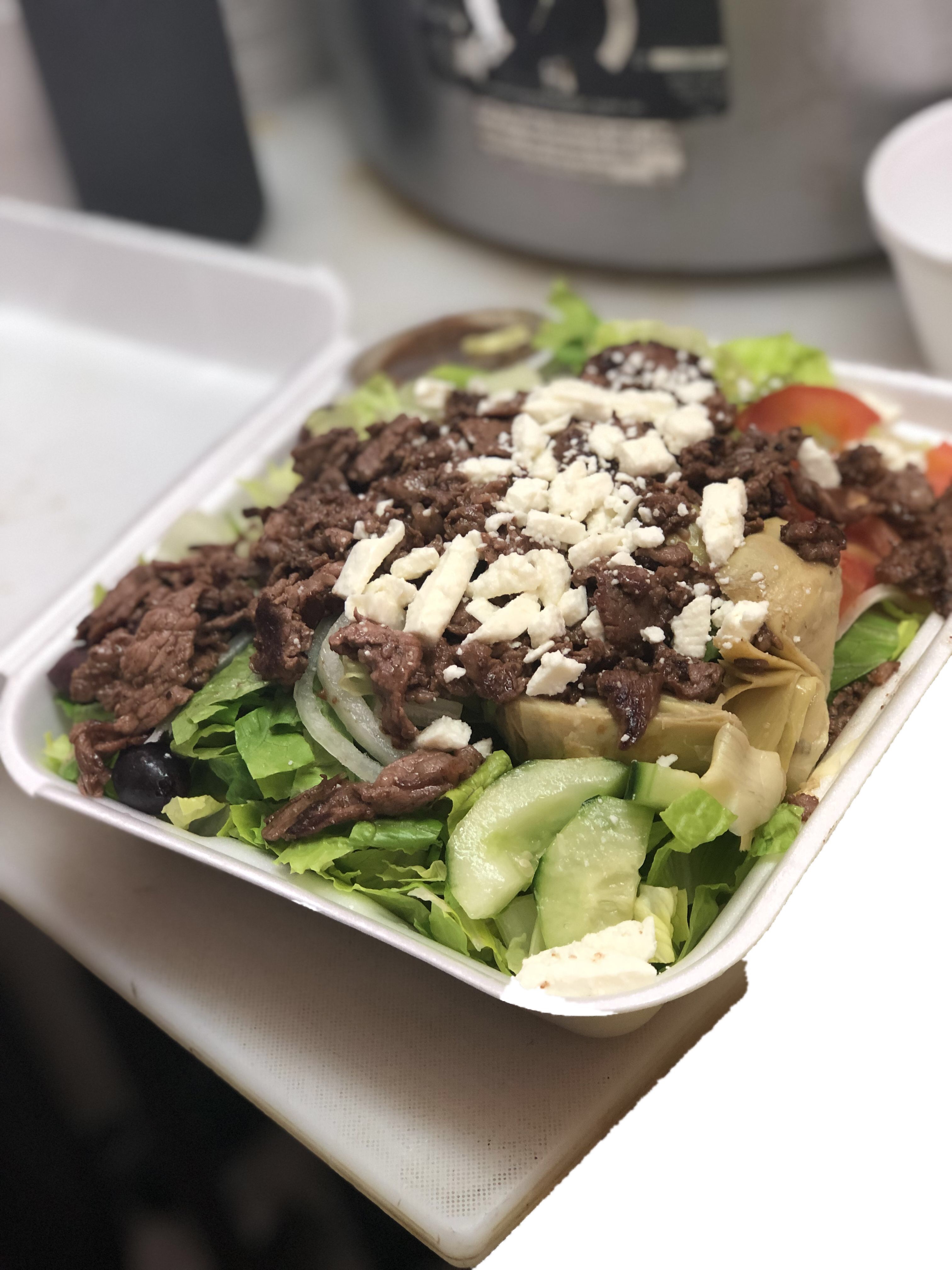 Order Greek Salad food online from Philly Cheesesteak store, Visalia on bringmethat.com