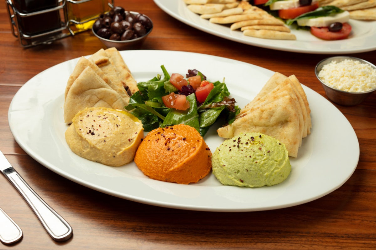Order Hummus Trio (A Must) food online from Panini Kabob Grill store, Irvine on bringmethat.com