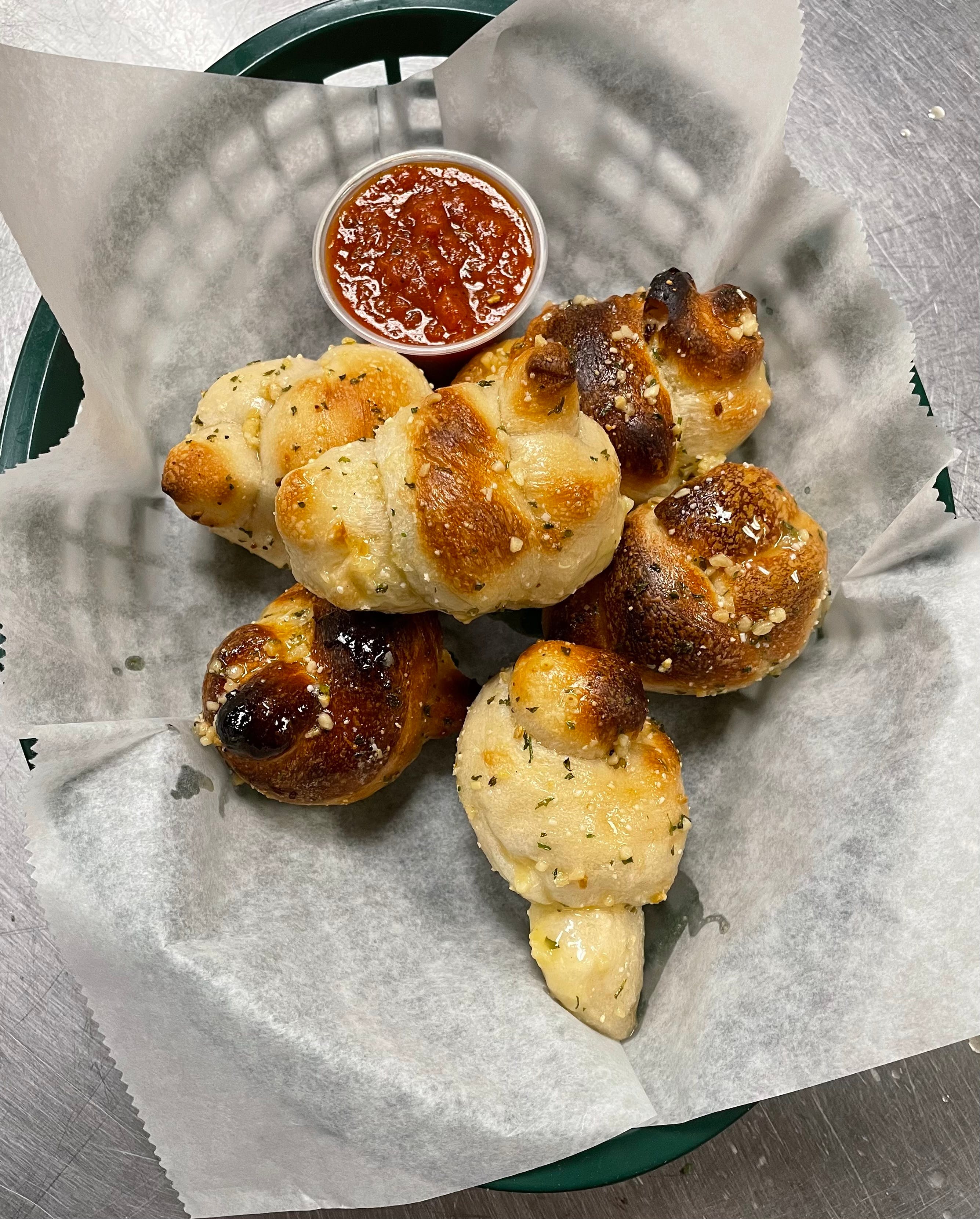 Order Garlic Knots - 6 Pieces food online from Brooklyn Pizza & Pasta store, Cincinnati on bringmethat.com