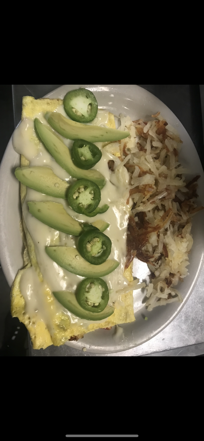 Order Spicy Poblano and Beef Omelet food online from Westside Diner store, West Lafayette on bringmethat.com