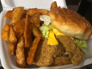 Order Fish Sandwich food online from Johnny T Fish & Wings store, Little Rock on bringmethat.com
