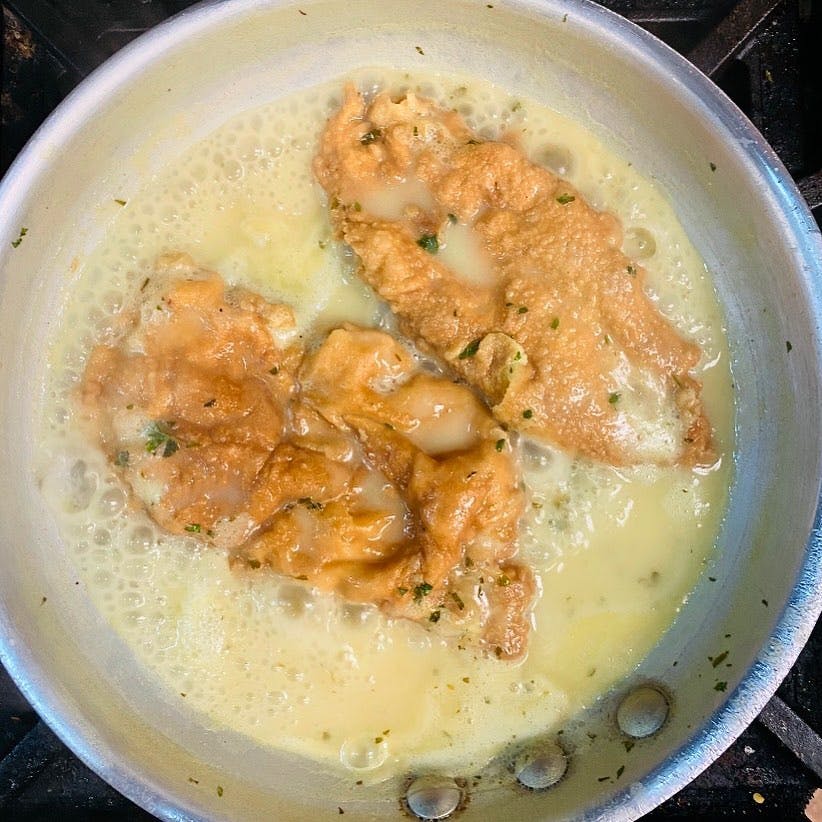 Order Chicken Francese - Entree food online from La Famiglia Pizzeria and Restaurant store, Glen Cove on bringmethat.com